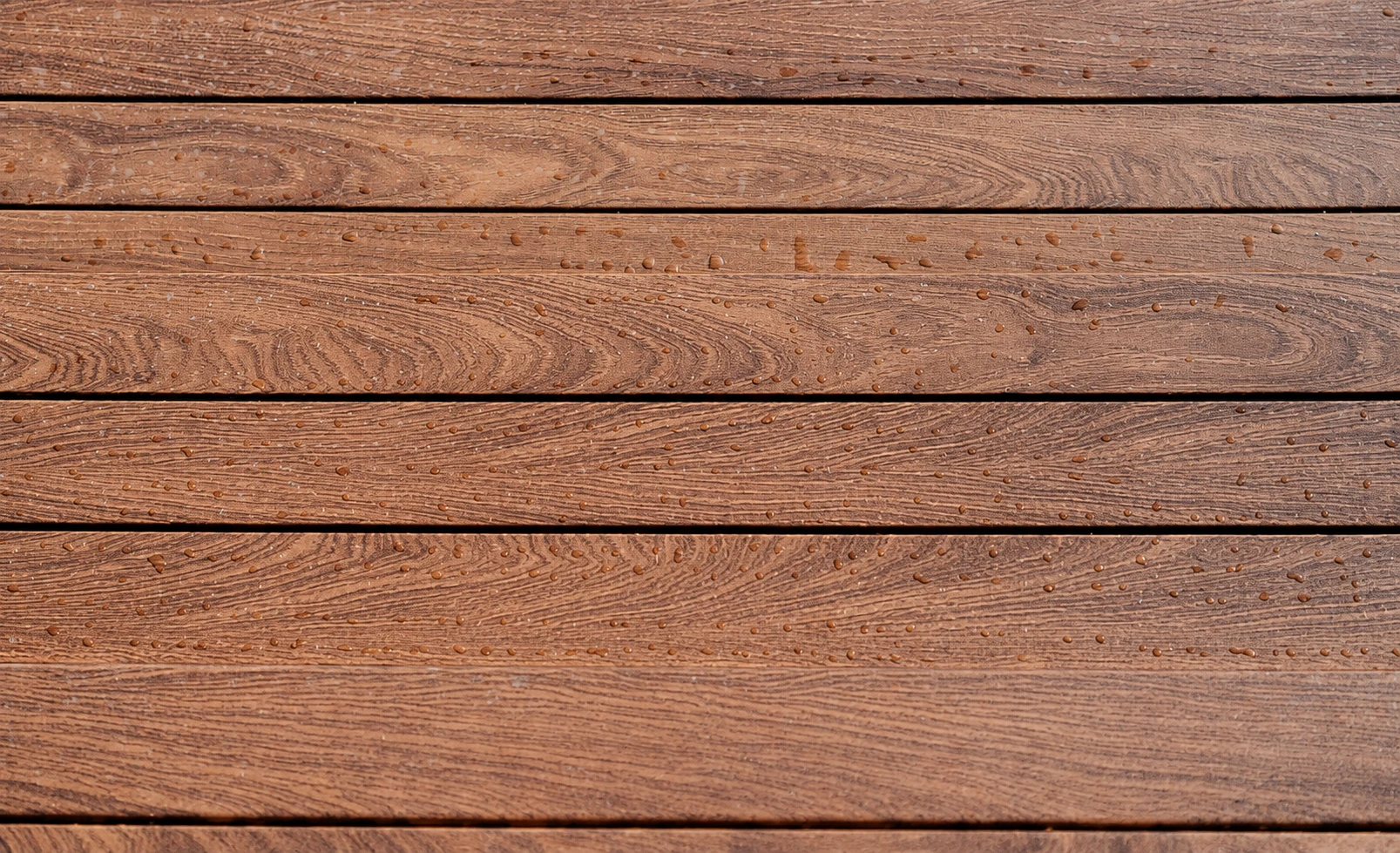Water on Aludeck wood-grain aluminium floor boards